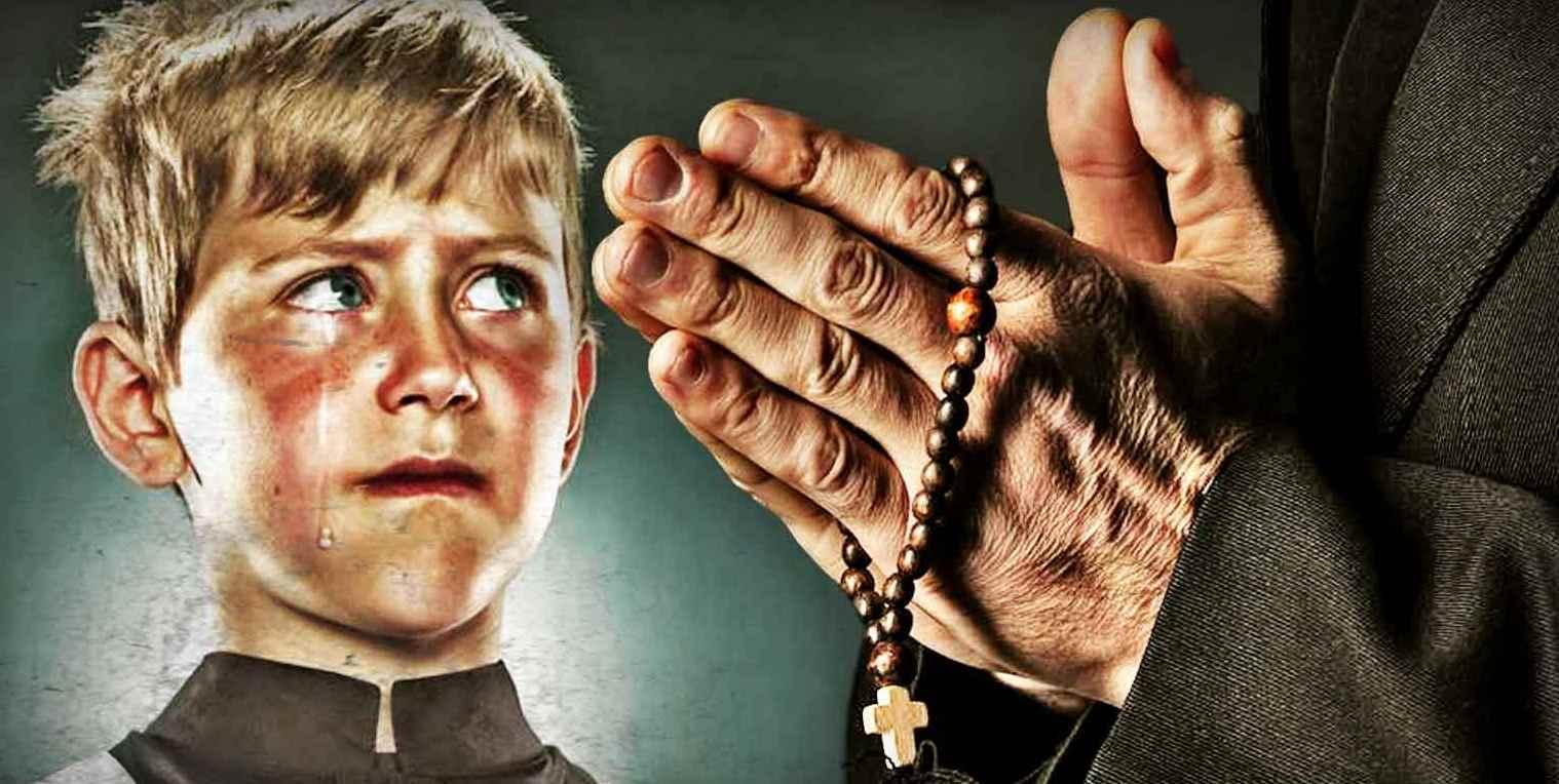 Young boy with priest.